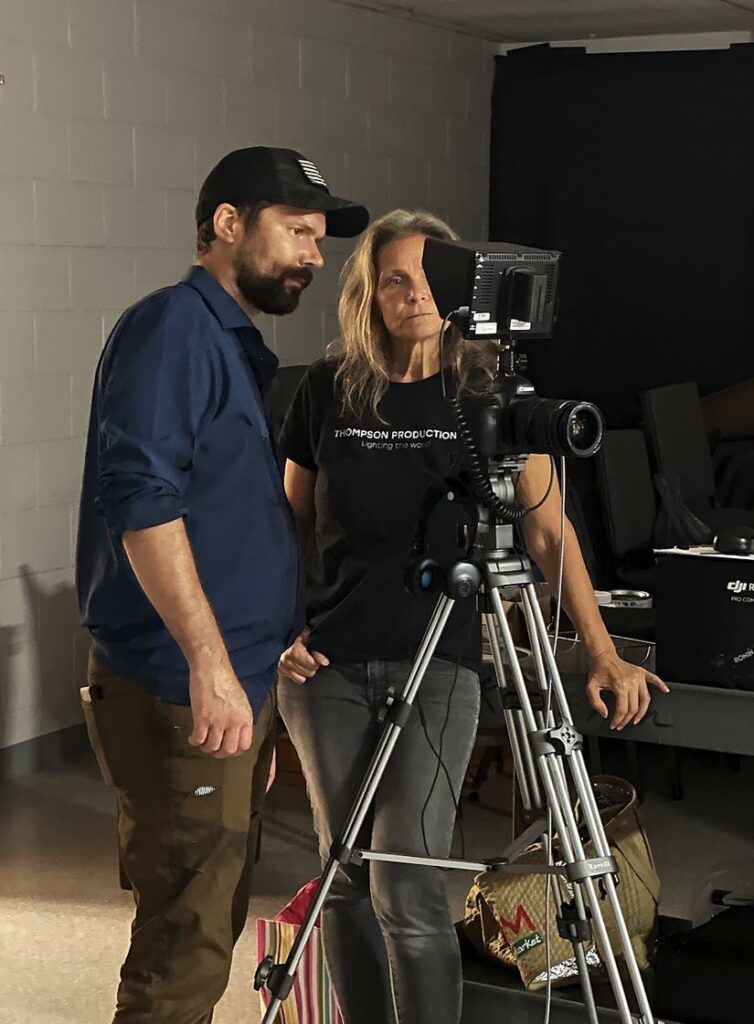 Tammy and Raymond review footage on set of Word and Deed