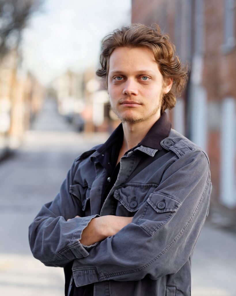 Actor Slayden Plassman as Agent Dean Parker